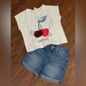 Zara cherry flip shirt paired with jean shorts